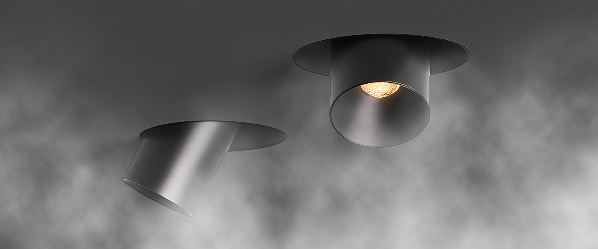 Pair of prado Light + Ventilation trimless downlights extracting steam 