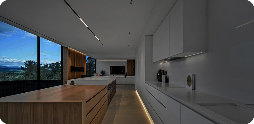 About Lighting Design To Go® - contemporary open plan kitchen, dining and living room with downlights, linear profile, recessed track lighting 