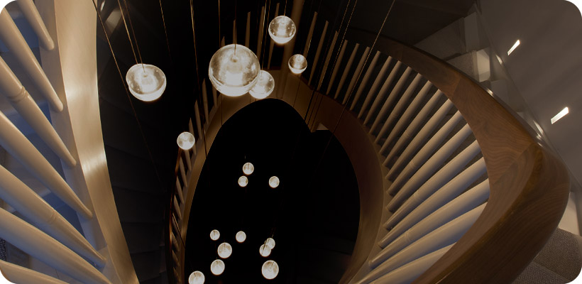 About Premium Lighting Design: 17 Bocci globe pendants suspended at different heights down the centre of a large spiral staircase