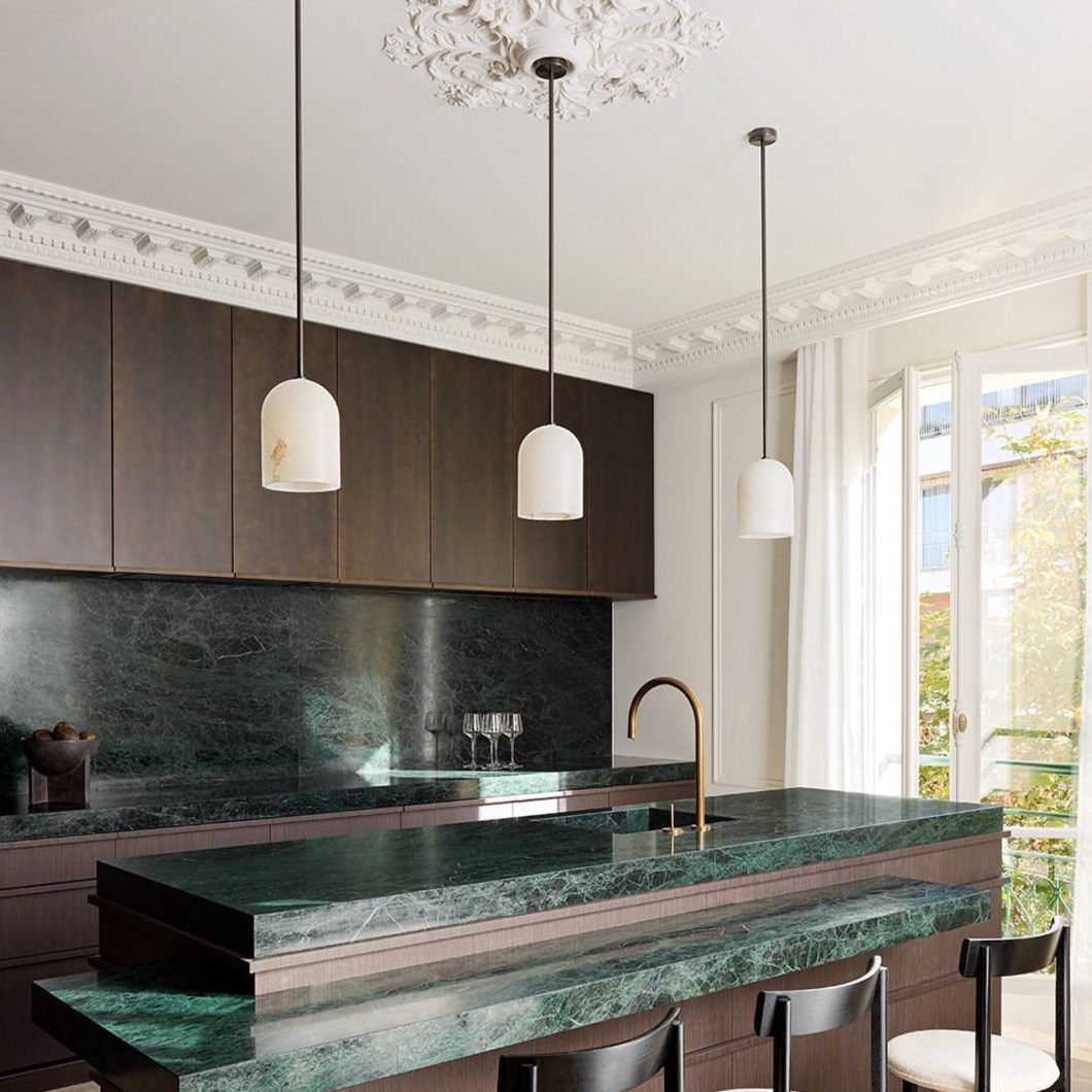 Contain Belfry Alabaster Tube Pendants in series above kitchen island