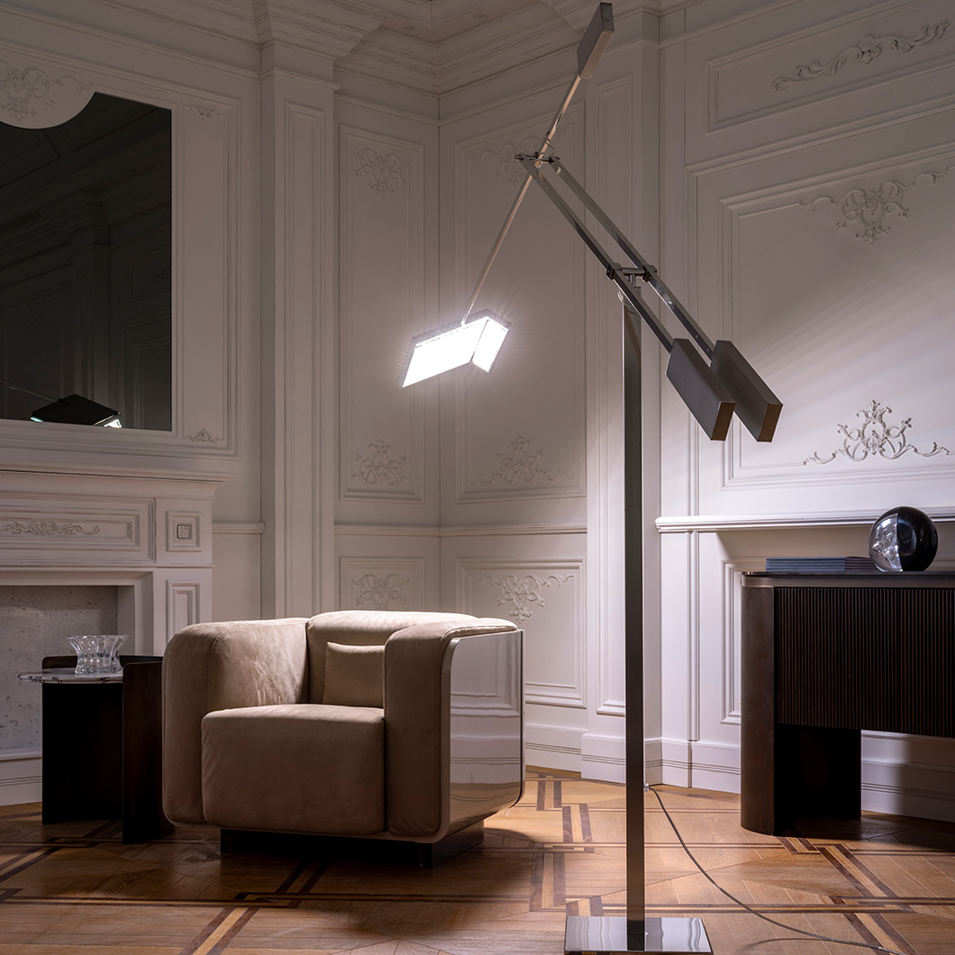 Esperia Giraffa Floor Lamp in centre of lounge over armchair alternative image