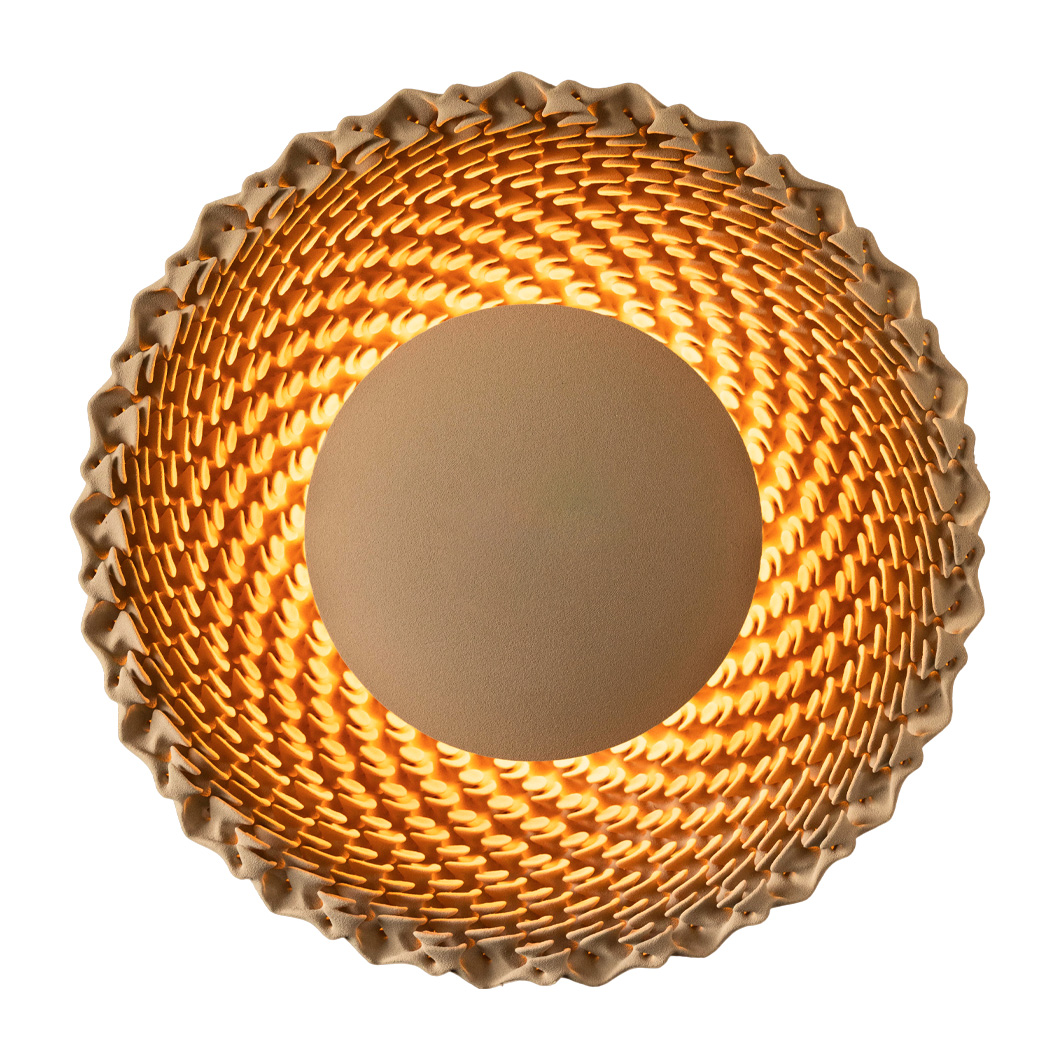 Round wall light made from beige quartz sand